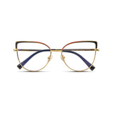 Γυαλιά Blue Light Marilyn Noir Gold με μεταλλικό σκελετό και cat eye σχήμα σε χρυσή και μαύρη απόχρωση.